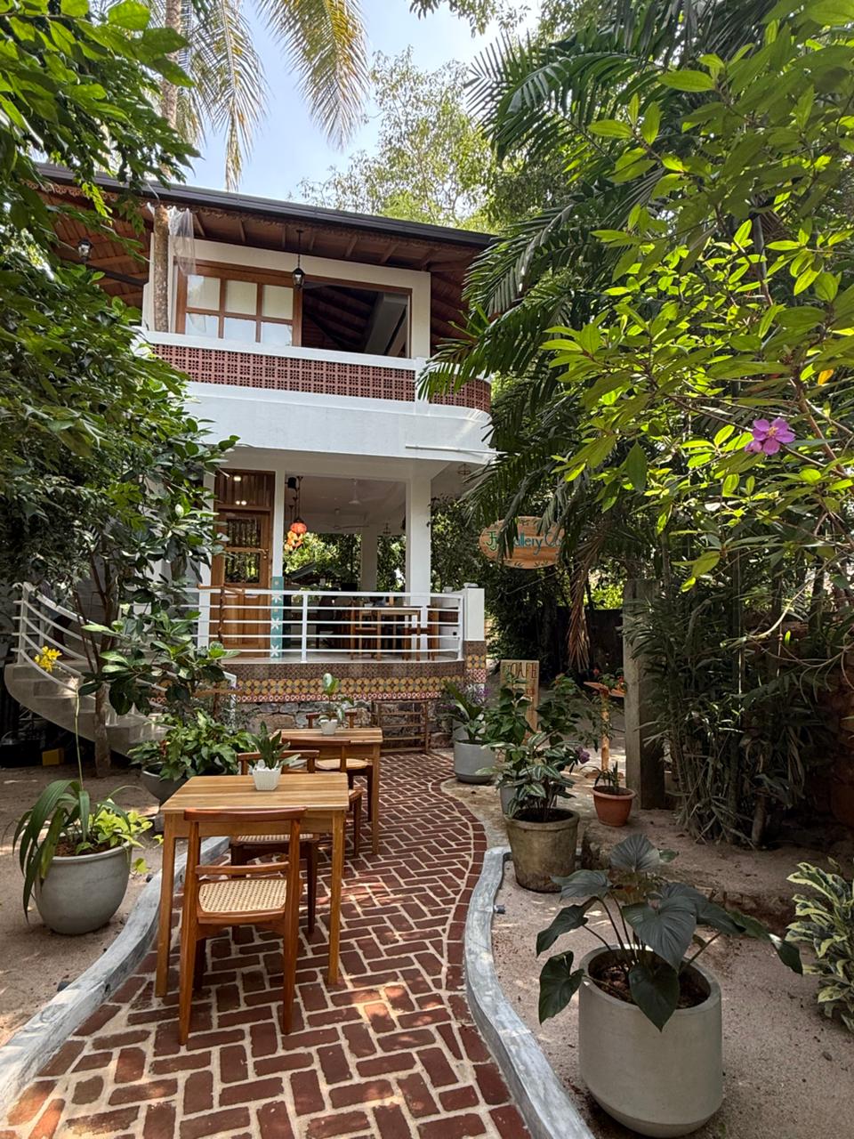 Garden courtyard seating at JJ Gallery Cafe